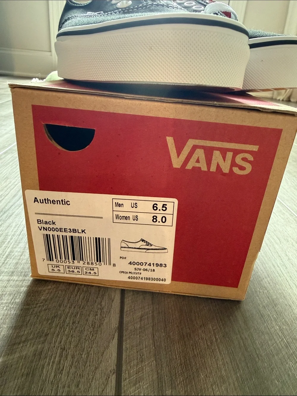 Vans Black Classic Slip-On Style Canvas Sneakers